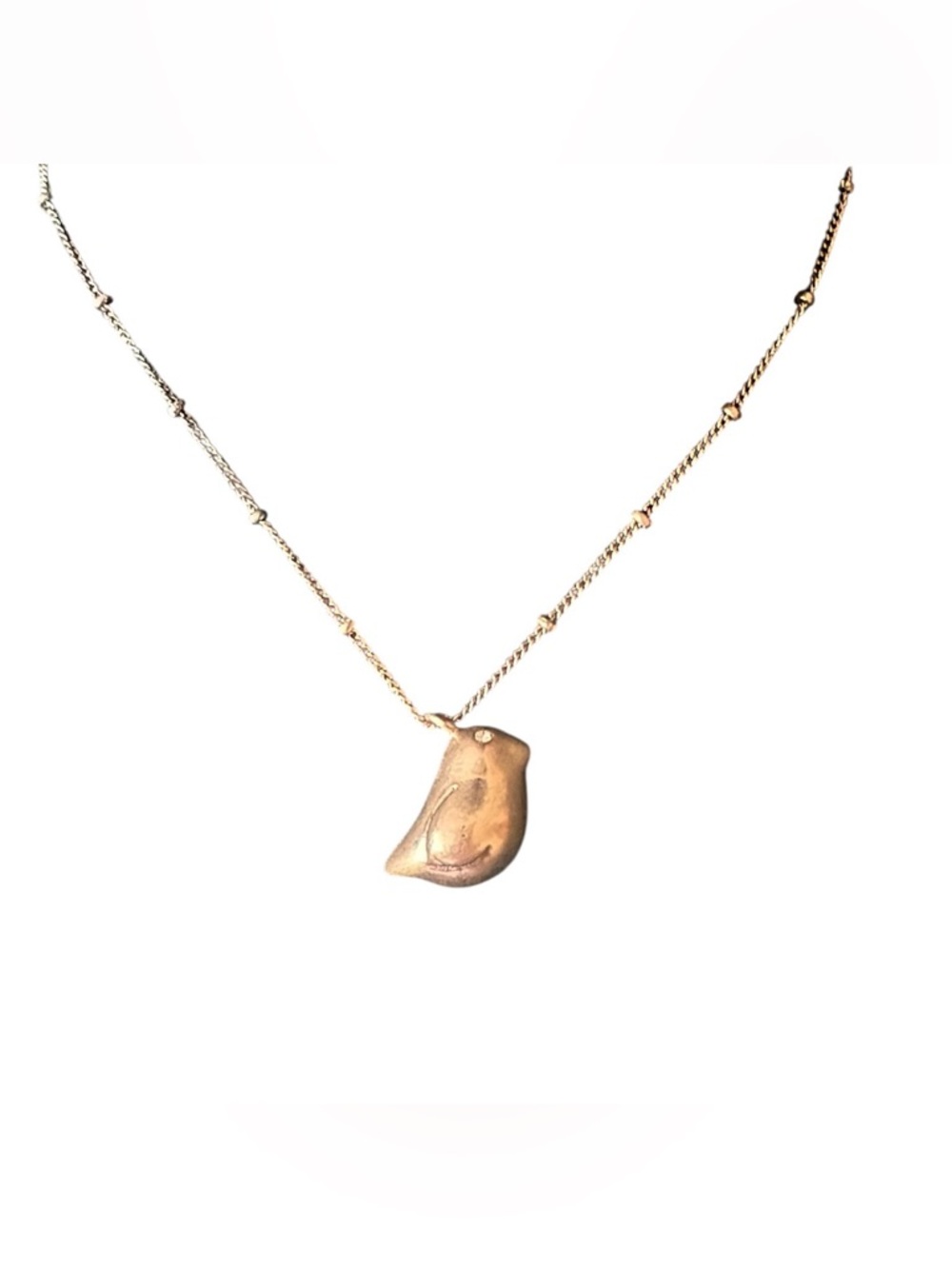 Fossil Gold Bird Charm Necklace